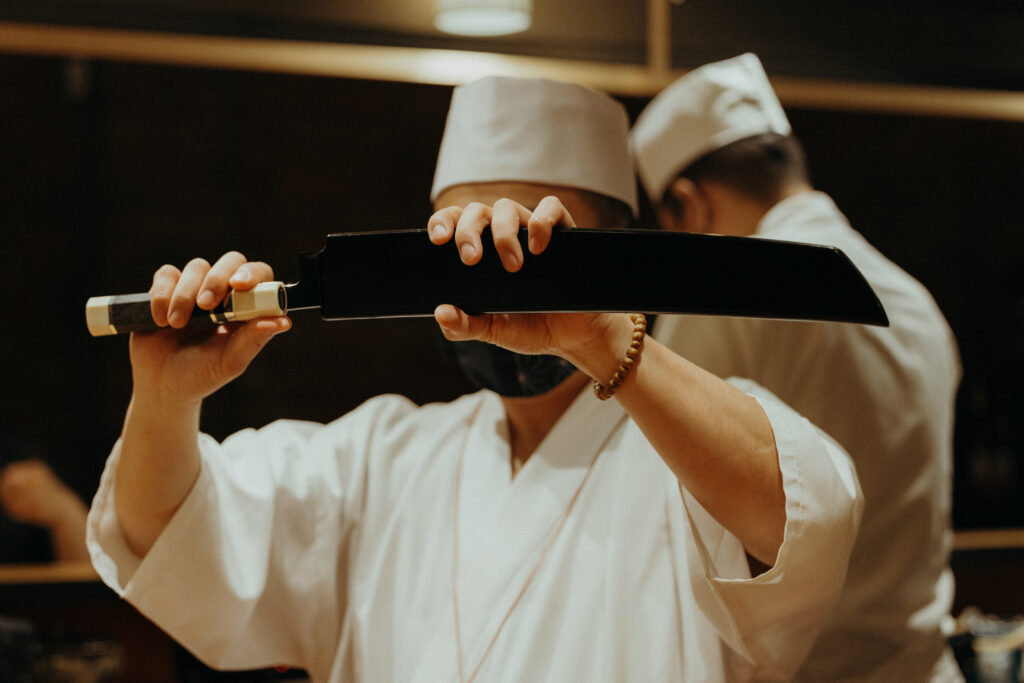 Chef showing a Japanese knife